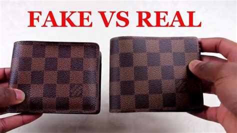 louis vuitton card holder real vs fake|is louis vuitton card holder genuine.